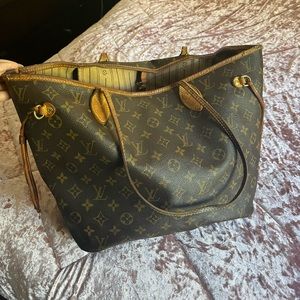 Loved authentic (medium) never full recently restitched. Same day ship!